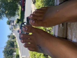 Tootsies peeping out the window 